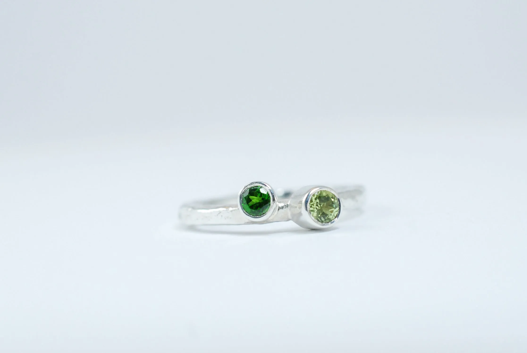 Silver two green stone stackable ring